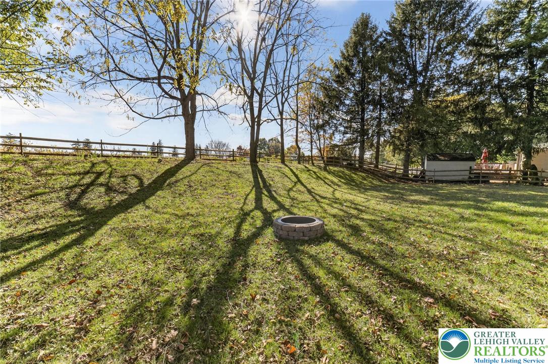 394 Manor Drive Nazareth, PA 18064 - Photo 41 of 44 a view of a yard with swimming pool