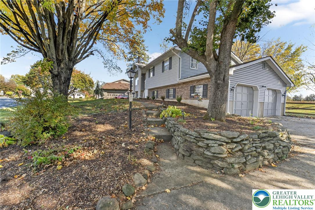 394 Manor Drive Nazareth, PA 18064 - Photo 7 of 44 a view of a house with a yard