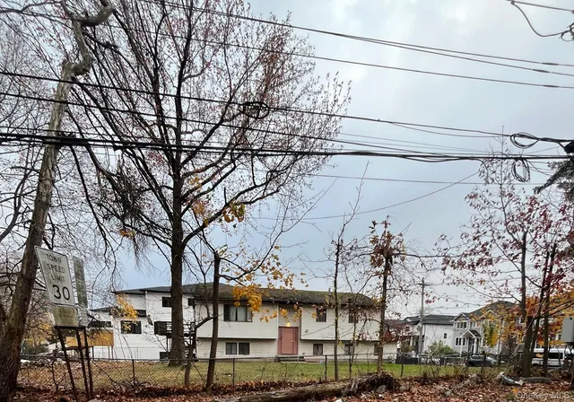 a view of a street with houses