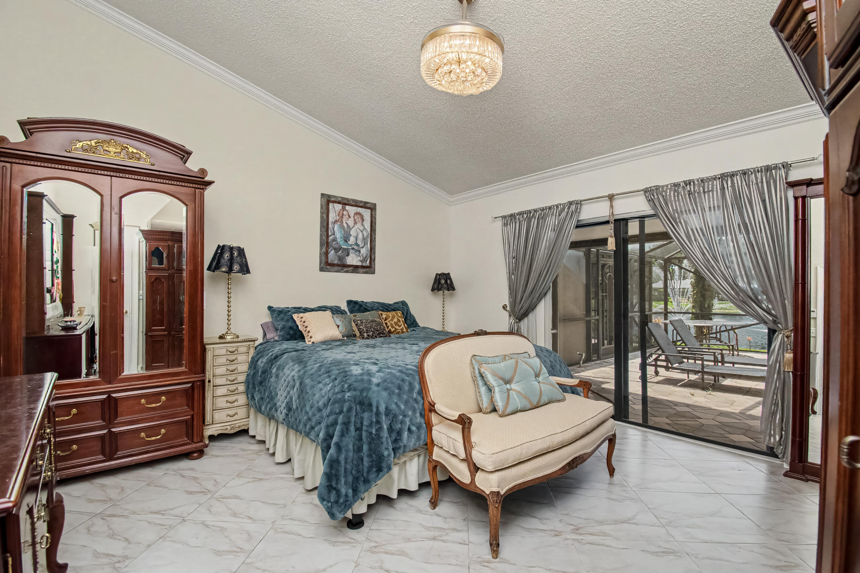 9708 Erica Court Boca Raton, FL 33496 - Photo 27 of 54 a bedroom with bed and wooden floor