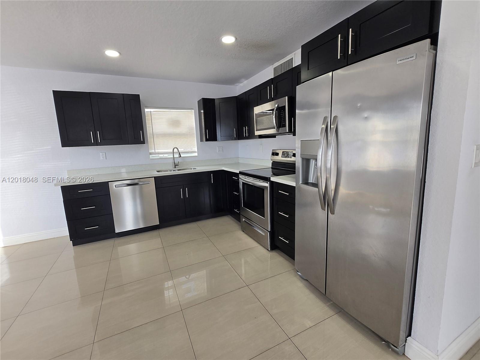 1707 Northwest 68th Terrace, Unit 1 Miami, FL 33147 - Photo 4 of 15