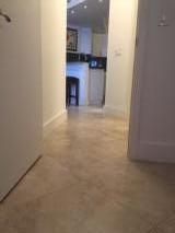 8761 Wiles Road, Unit 103 Coral Springs, FL 33067 - Photo 9 of 10 Hall way