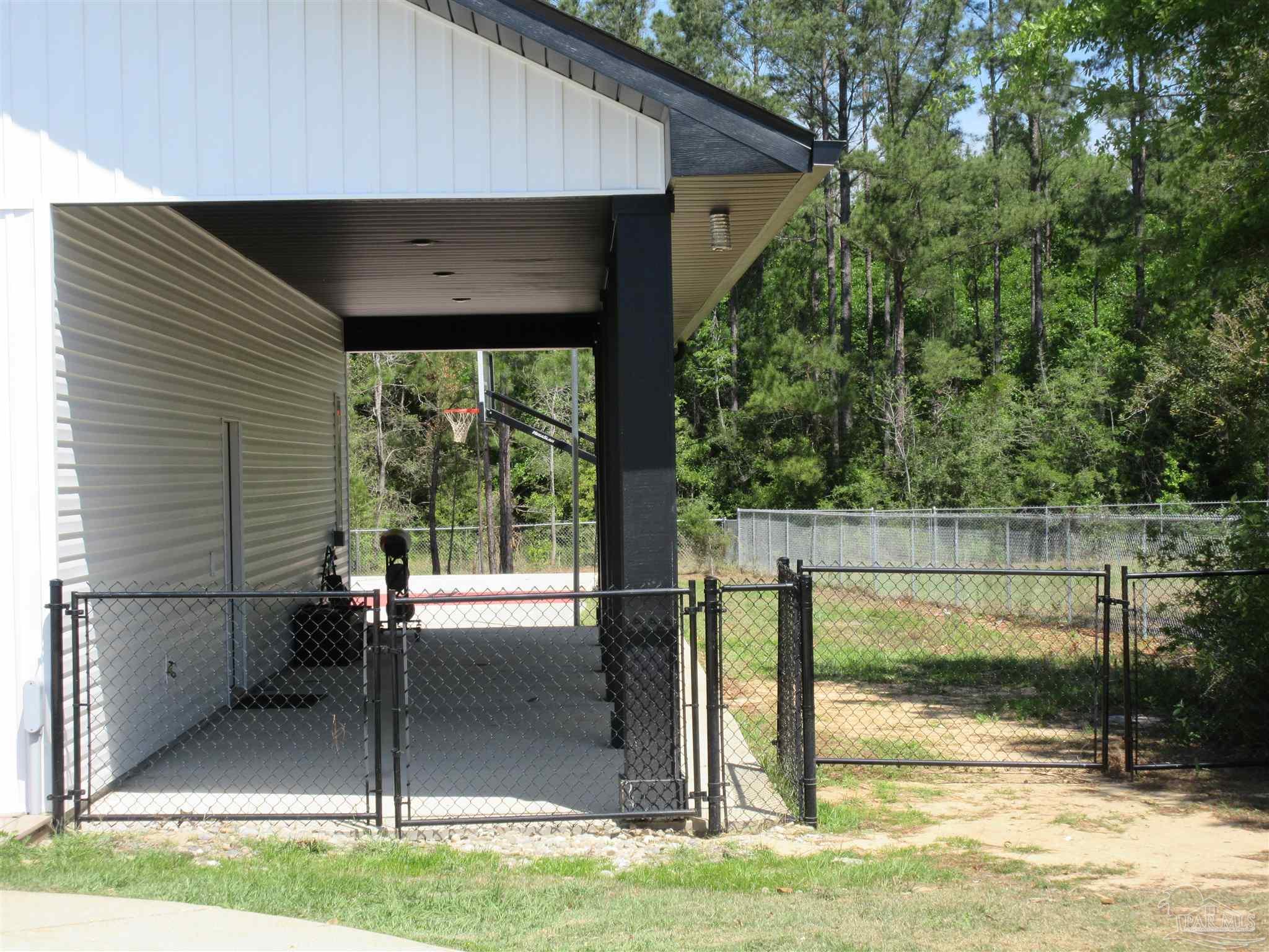2810 Wallace Lake Road Pace, FL 32571 - Photo 55 of 65 a view of a porch