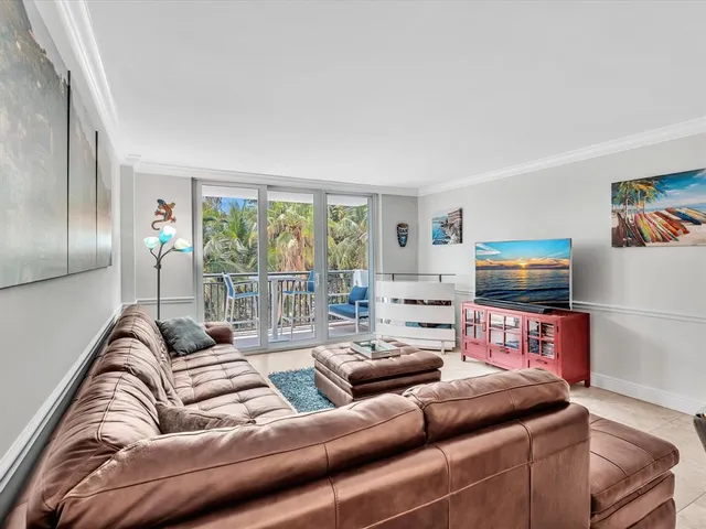 a view of a balcony with furniture