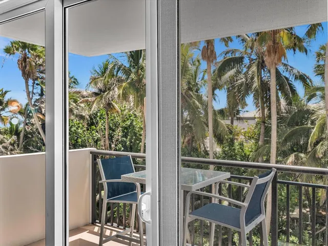 a kitchen with a sink and a refrigerator