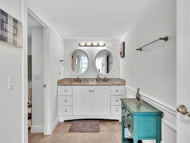 a view of a swimming pool and a yard