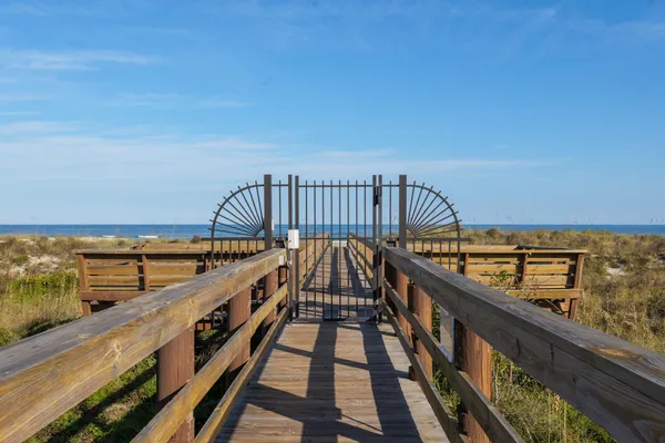 a view of a balcony with an ocean view