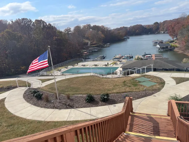 a view of a house with pool and mountain view