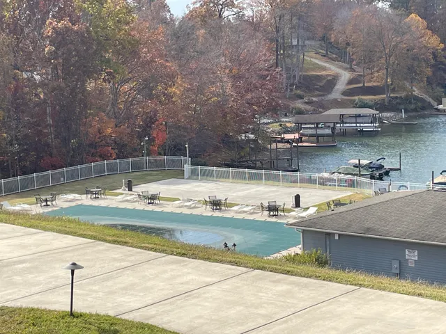 a view of swimming pool with outdoor seating