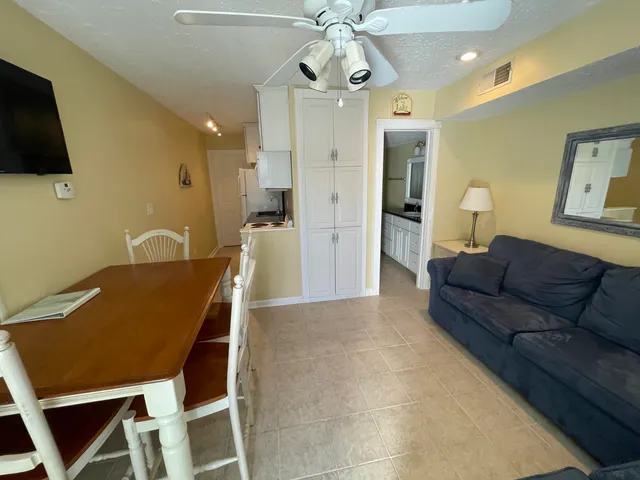 a living room with a couch and a flat screen tv