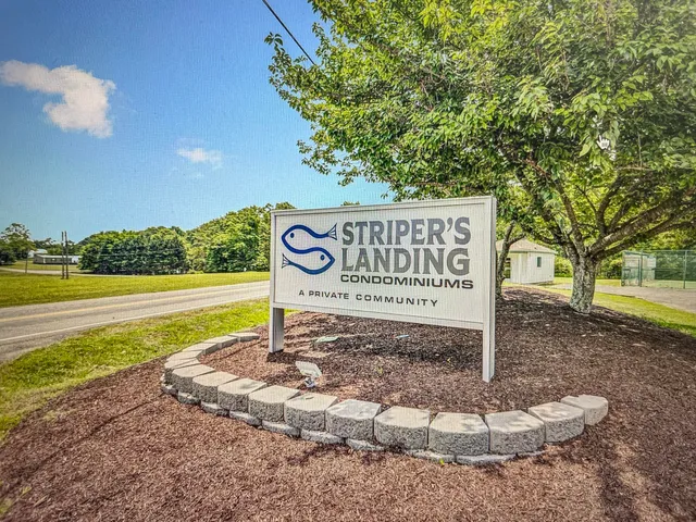 a sign on the side of the road