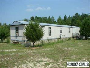 1360 Cason Oldfield Road Morven, NC 28119 - Photo 5 of 7 a view of a house with a yard