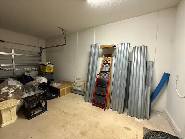 a bedroom with bed and a closet