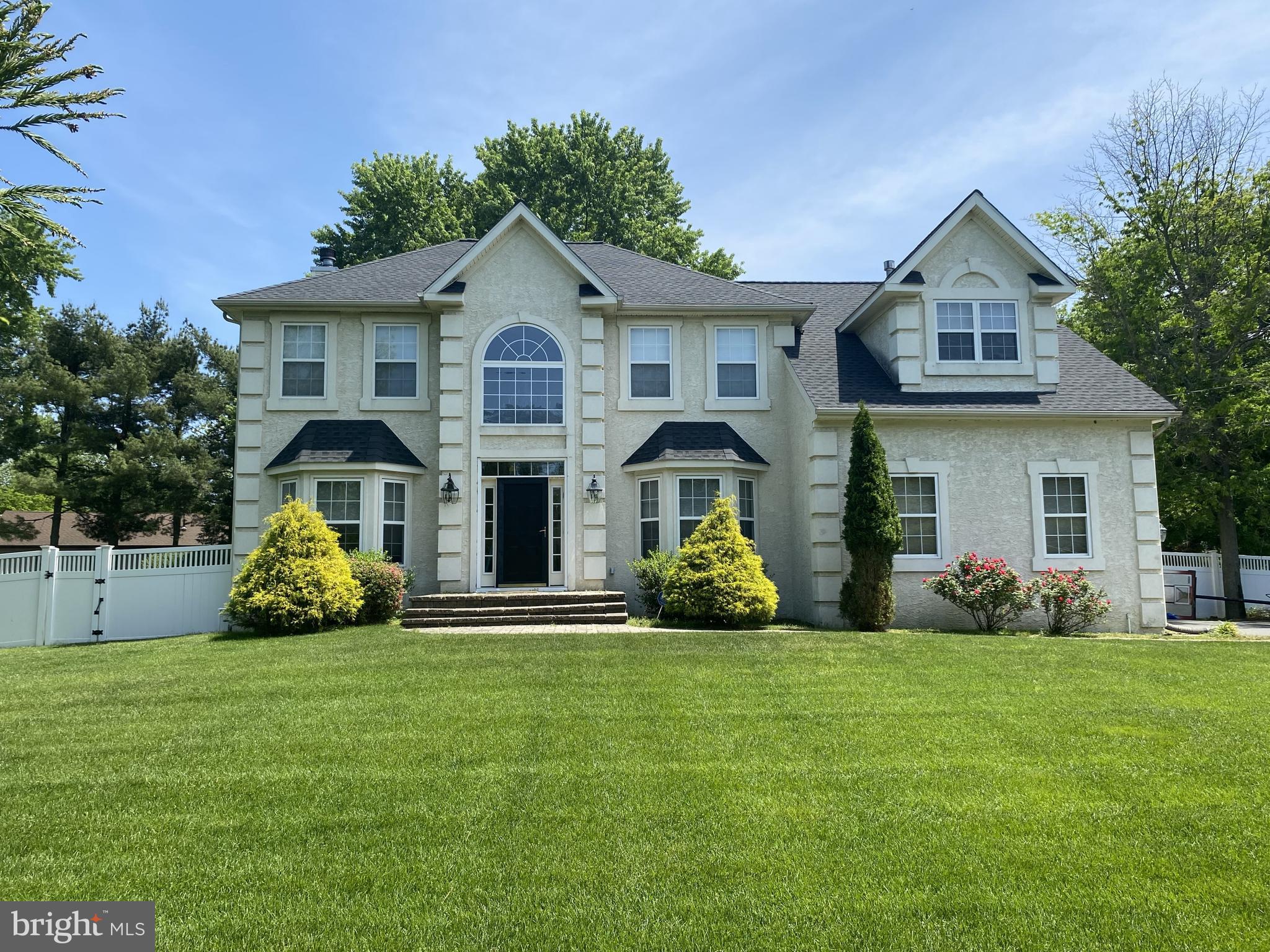 1 Elmwood Road Mount Laurel, NJ 08054 - Photo 1 of 44 a front view of a house with garden and porch