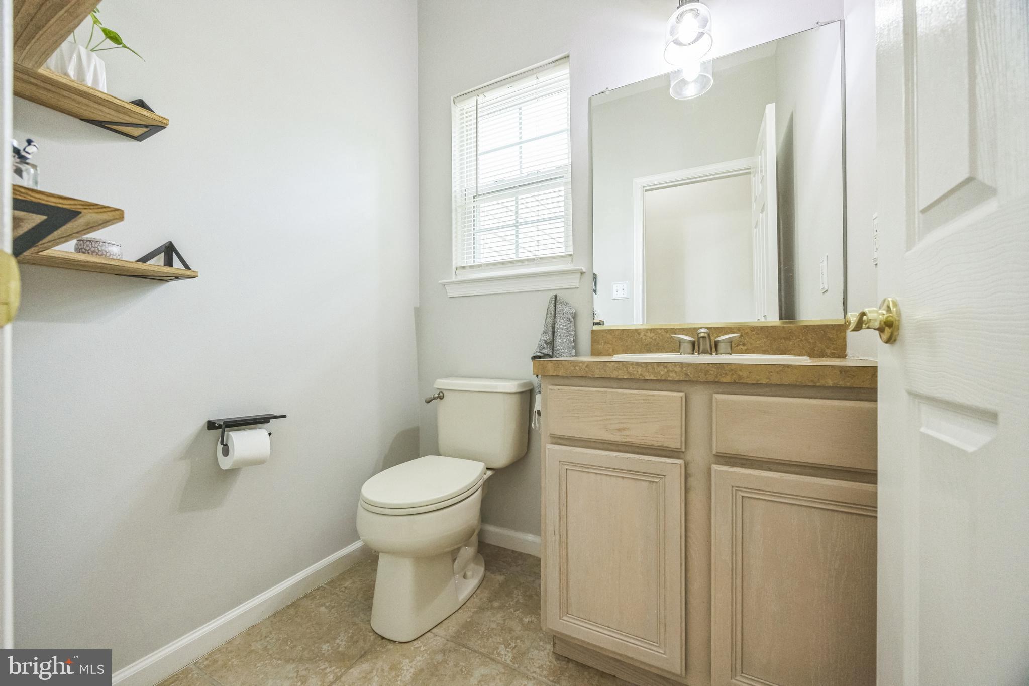 1 Elmwood Road Mount Laurel, NJ 08054 - Photo 14 of 44 a bathroom with a toilet sink and mirror