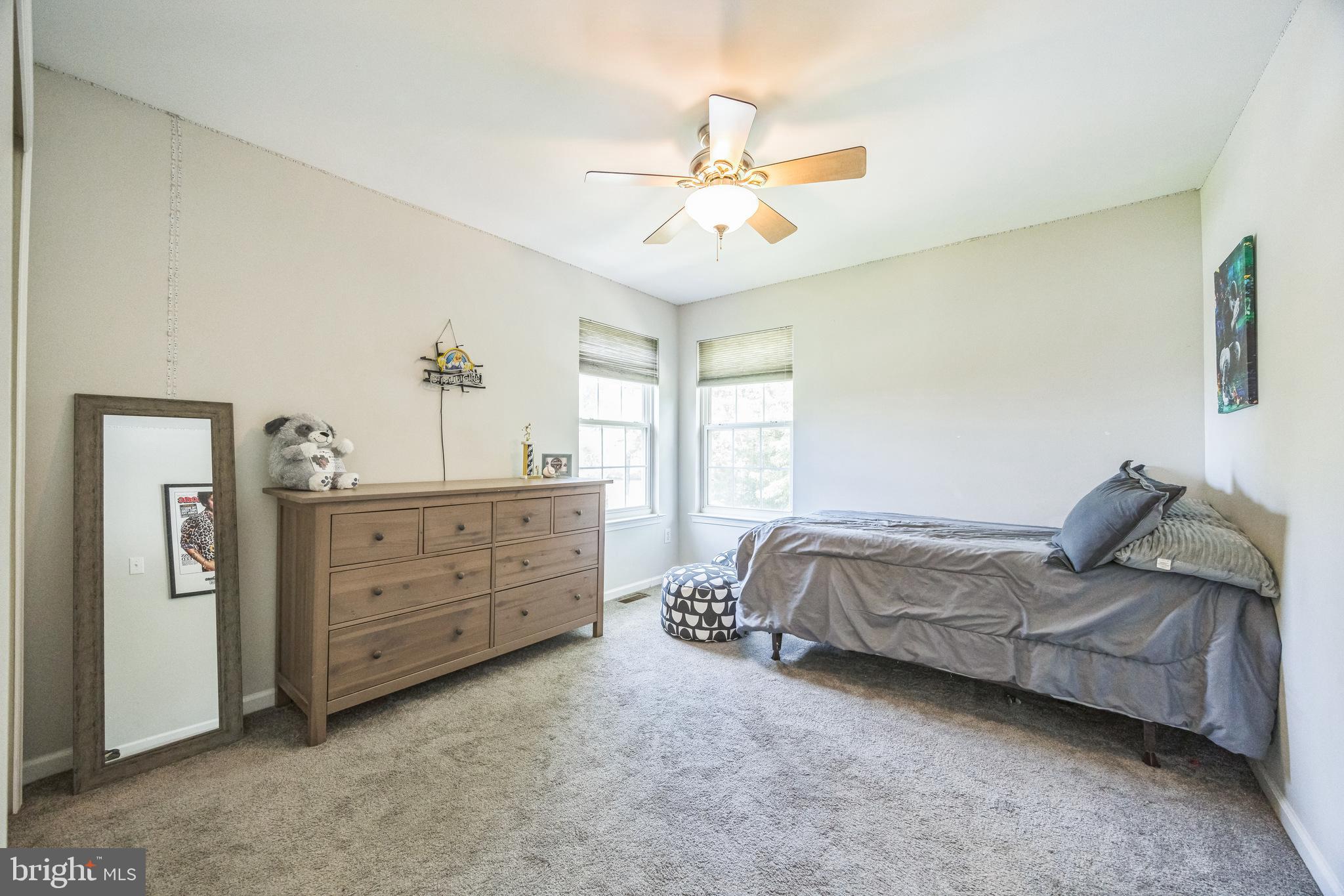 1 Elmwood Road Mount Laurel, NJ 08054 - Photo 25 of 44 a bed room with a bed and a window
