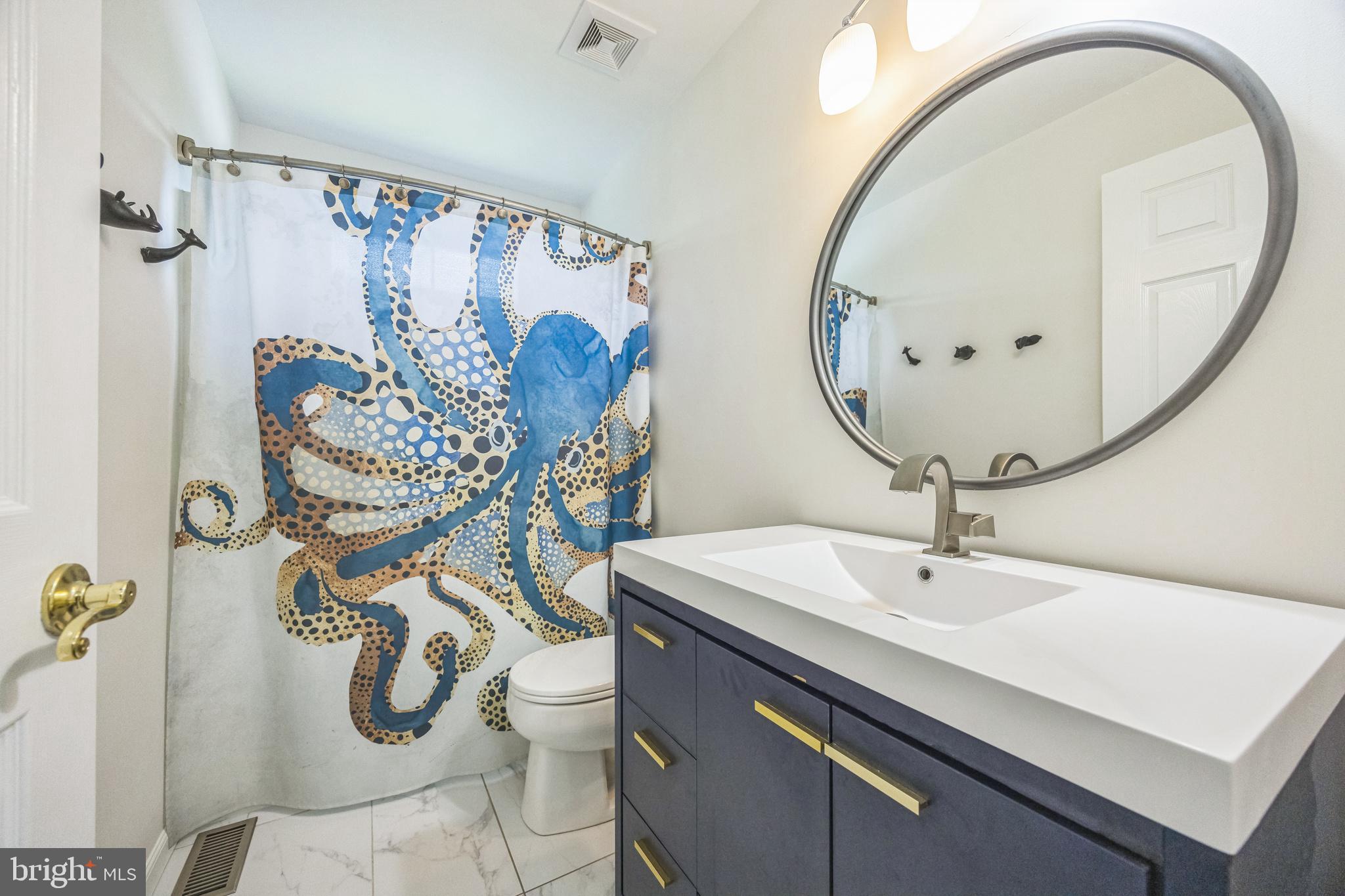 1 Elmwood Road Mount Laurel, NJ 08054 - Photo 26 of 44 a bathroom with a sink mirror and vanity