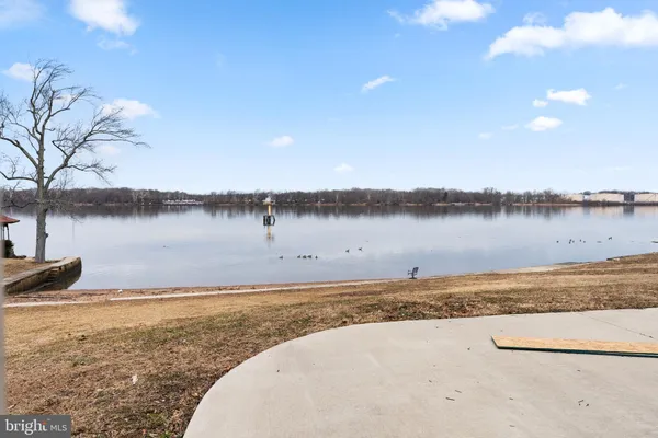 a view of a lake with a big yard
