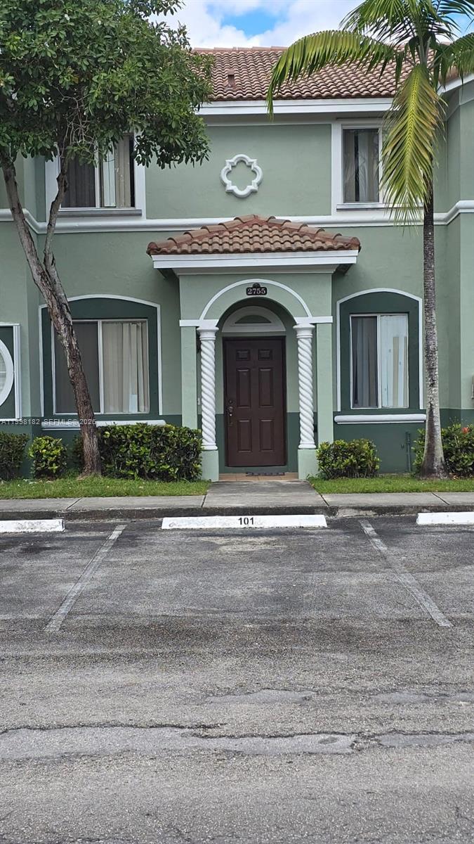2755 Southeast 15th Road, Unit 101 Homestead, FL 33035 - Photo 3 of 18 front view of a house