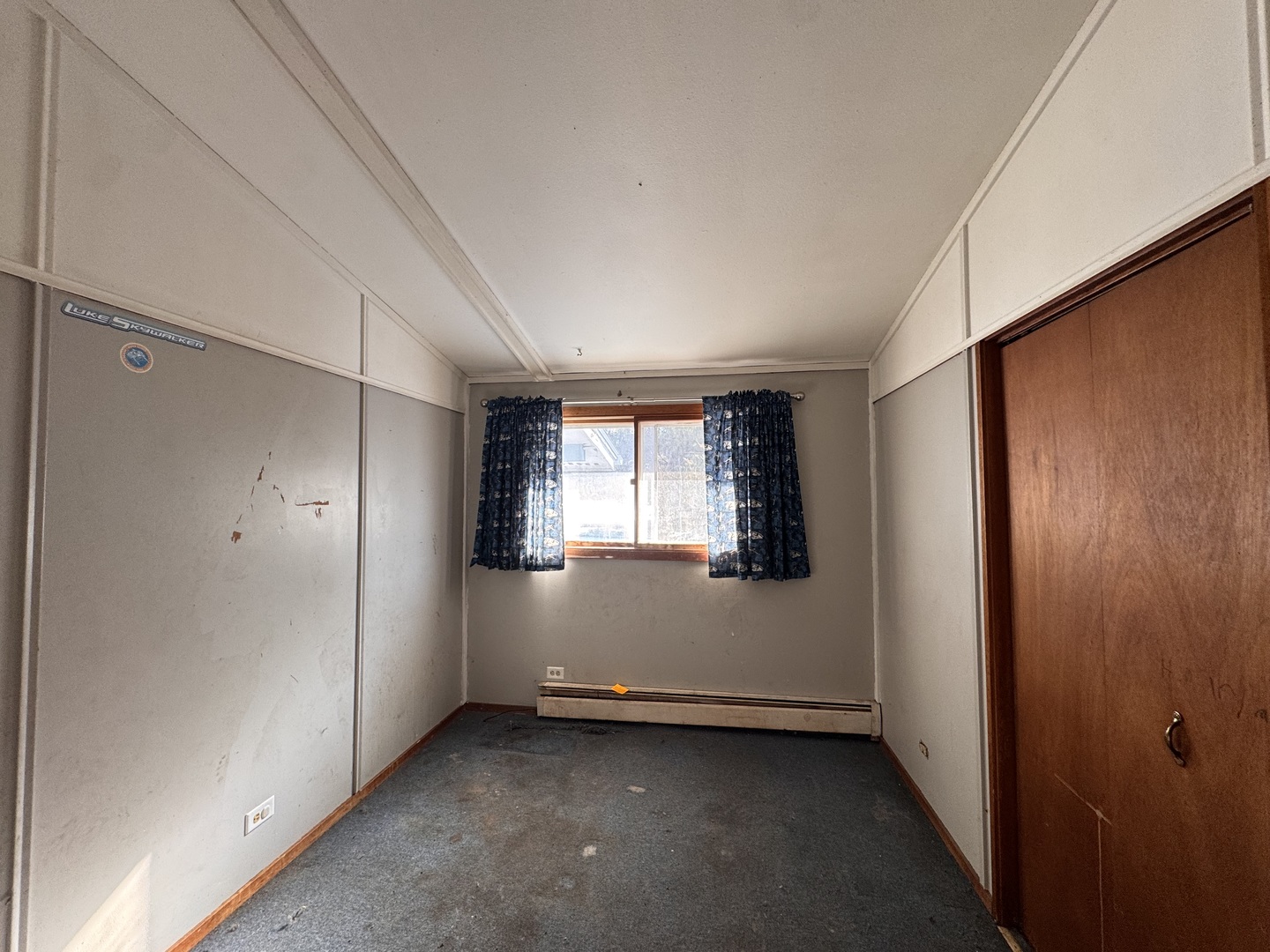 806 Northeast 3rd Street Galva, IL 61434 - Photo 11 of 20 a view of an empty room with a window