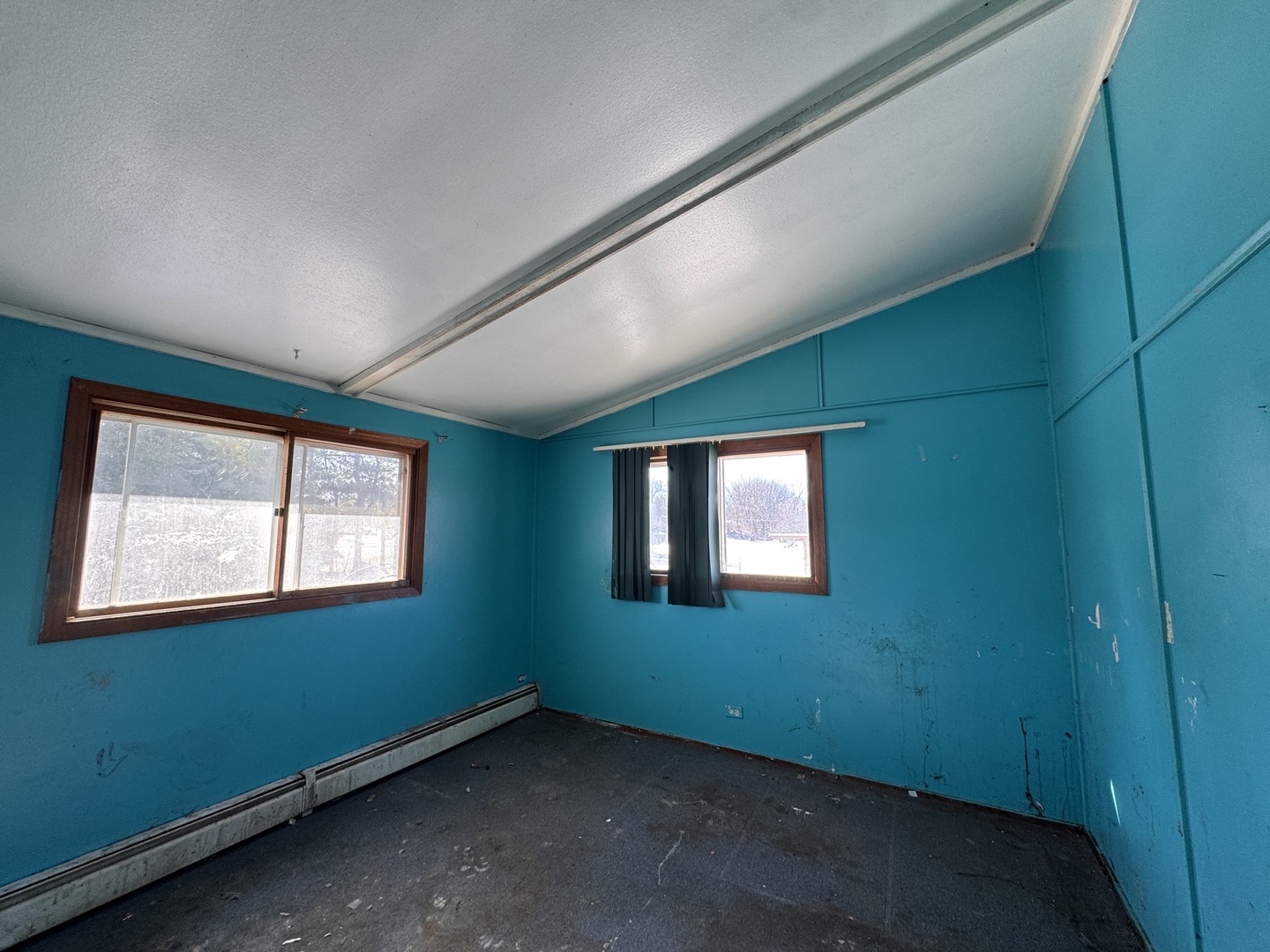 806 Northeast 3rd Street Galva, IL 61434 - Photo 13 of 20 a view of empty room with windows