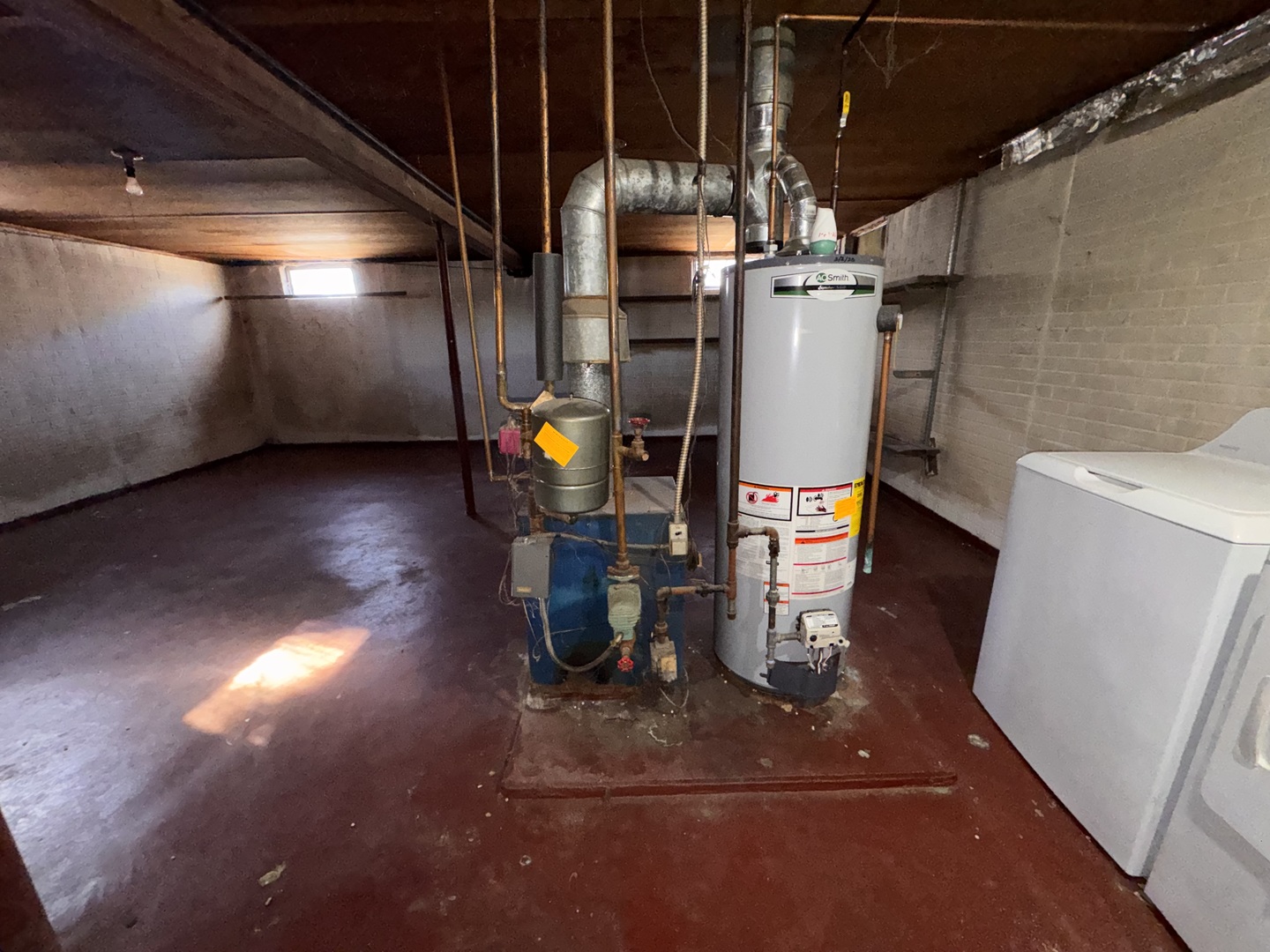 806 Northeast 3rd Street Galva, IL 61434 - Photo 18 of 20 a view of water heater room with wooden floor