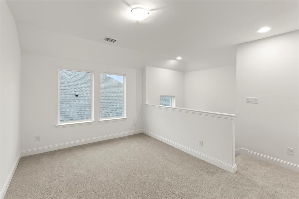1809 Gleasondale Place Forney, TX 75126 - Photo 14 of 34 a view of an empty room with a window