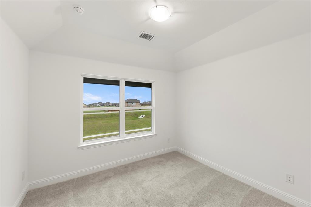 1809 Gleasondale Place Forney, TX 75126 - Photo 20 of 34 an empty room with a window