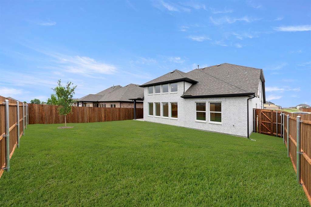 1809 Gleasondale Place Forney, TX 75126 - Photo 27 of 34 a house view with a garden space