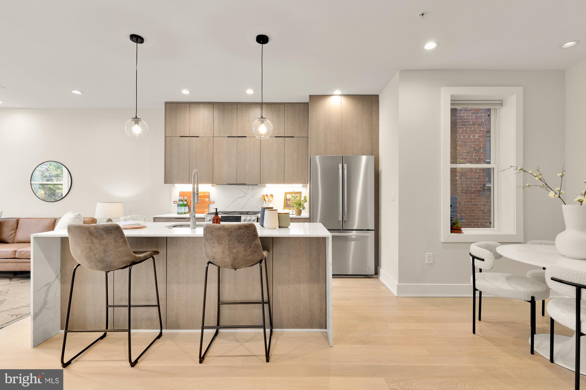 1747 T Street Northwest, Unit 4 Washington, DC 20009 - Photo 7 of 30 Chic kitchen with convenient bar for entertaining