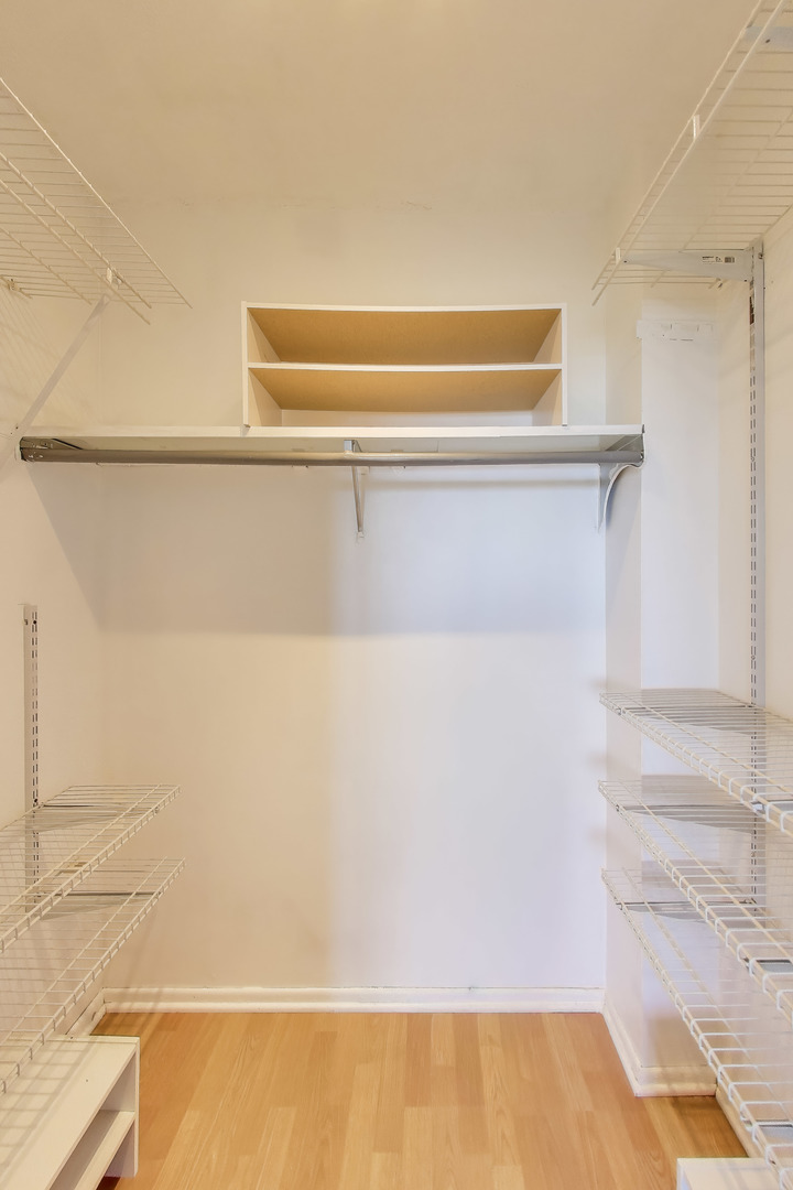 8809 West Golf Road, Unit 8I Niles, IL 60714 - Photo 18 of 27 a close up of a shower