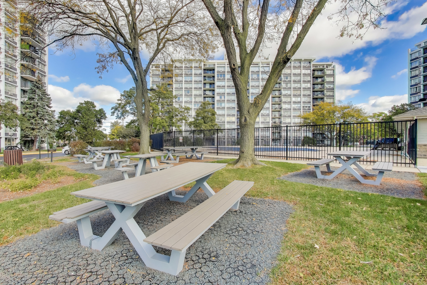 8809 West Golf Road, Unit 8I Niles, IL 60714 - Photo 25 of 27 a view of swimming pool with outdoor seating and plants