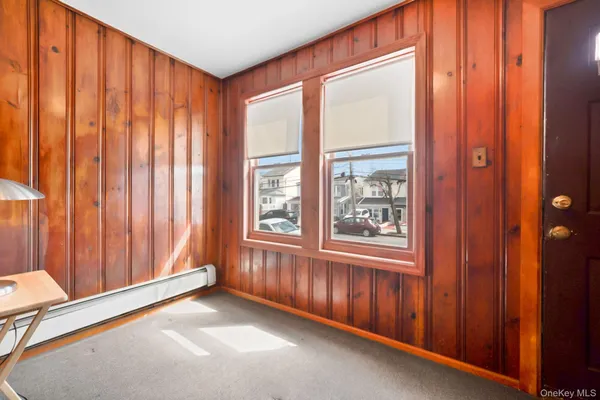 a view of an empty room and window