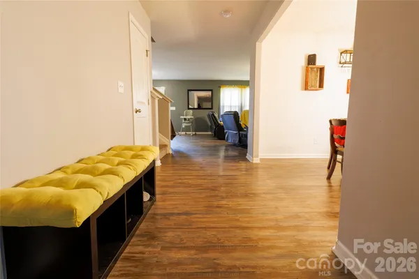 a view of a balcony with wooden floor