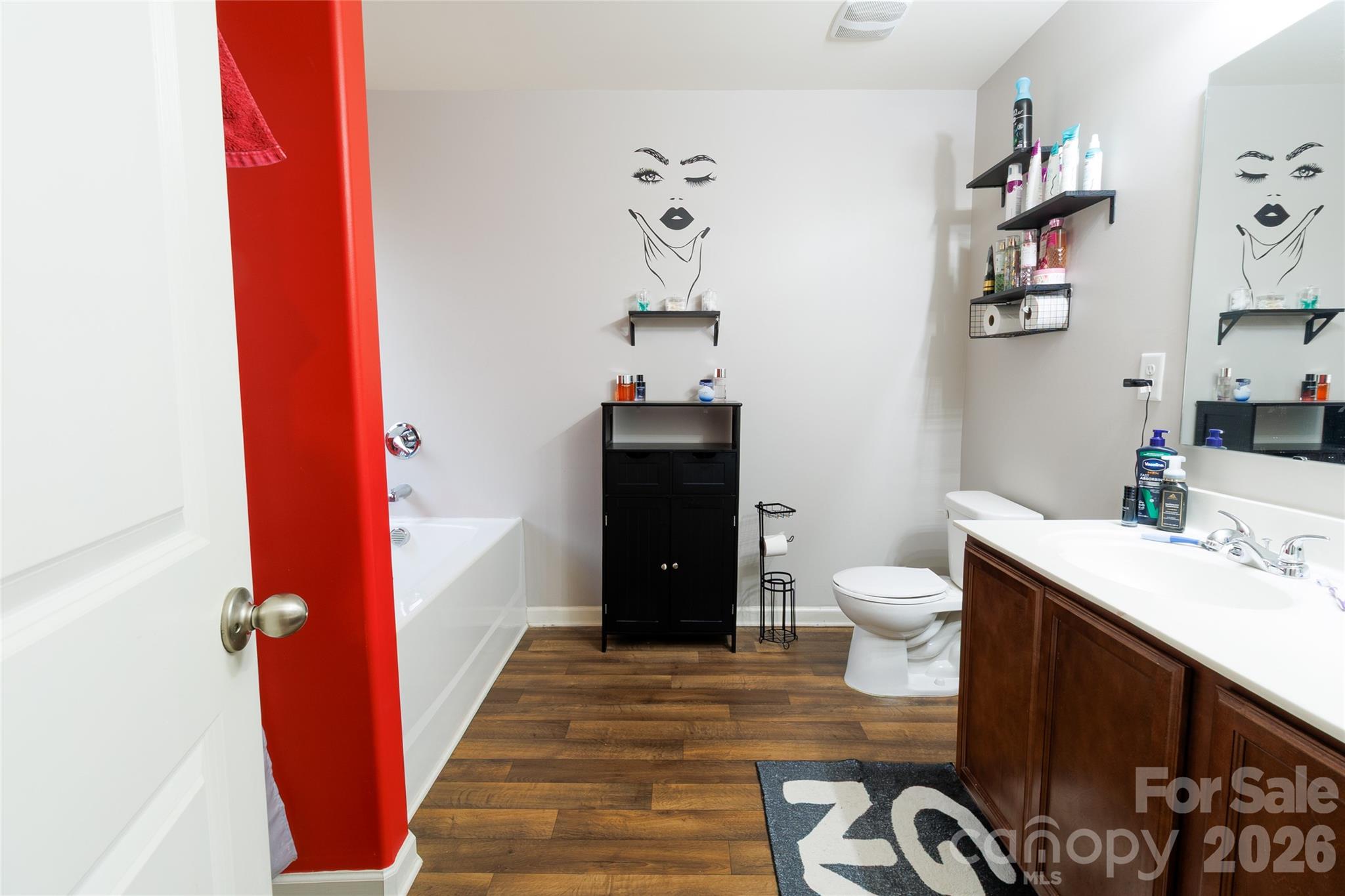 658 Buckskin Road Oakboro, NC 28129 - Photo 12 of 30 a bathroom with a sink and a mirror