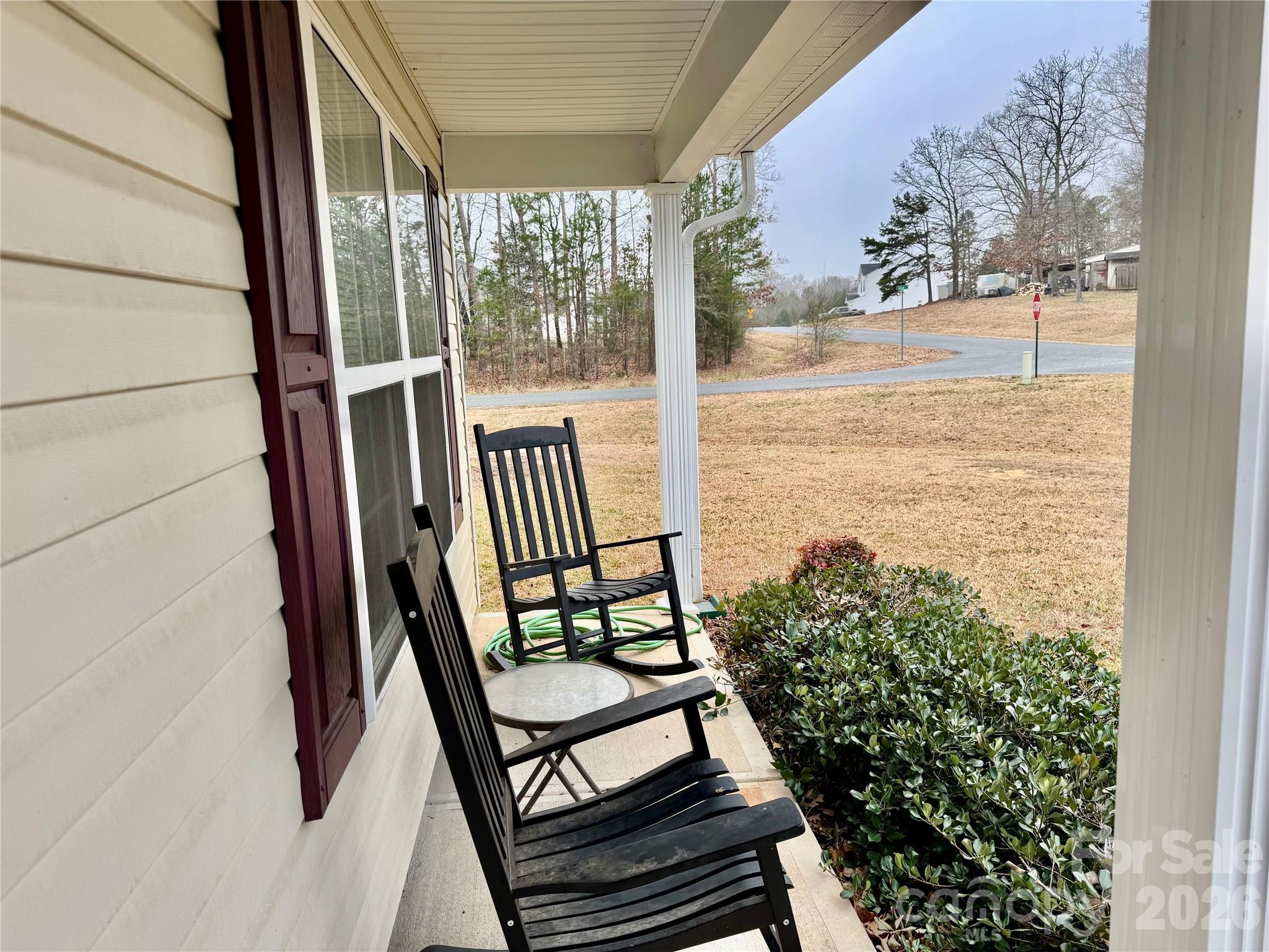 658 Buckskin Road Oakboro, NC 28129 - Photo 16 of 30 a view of a balcony with wooden floor