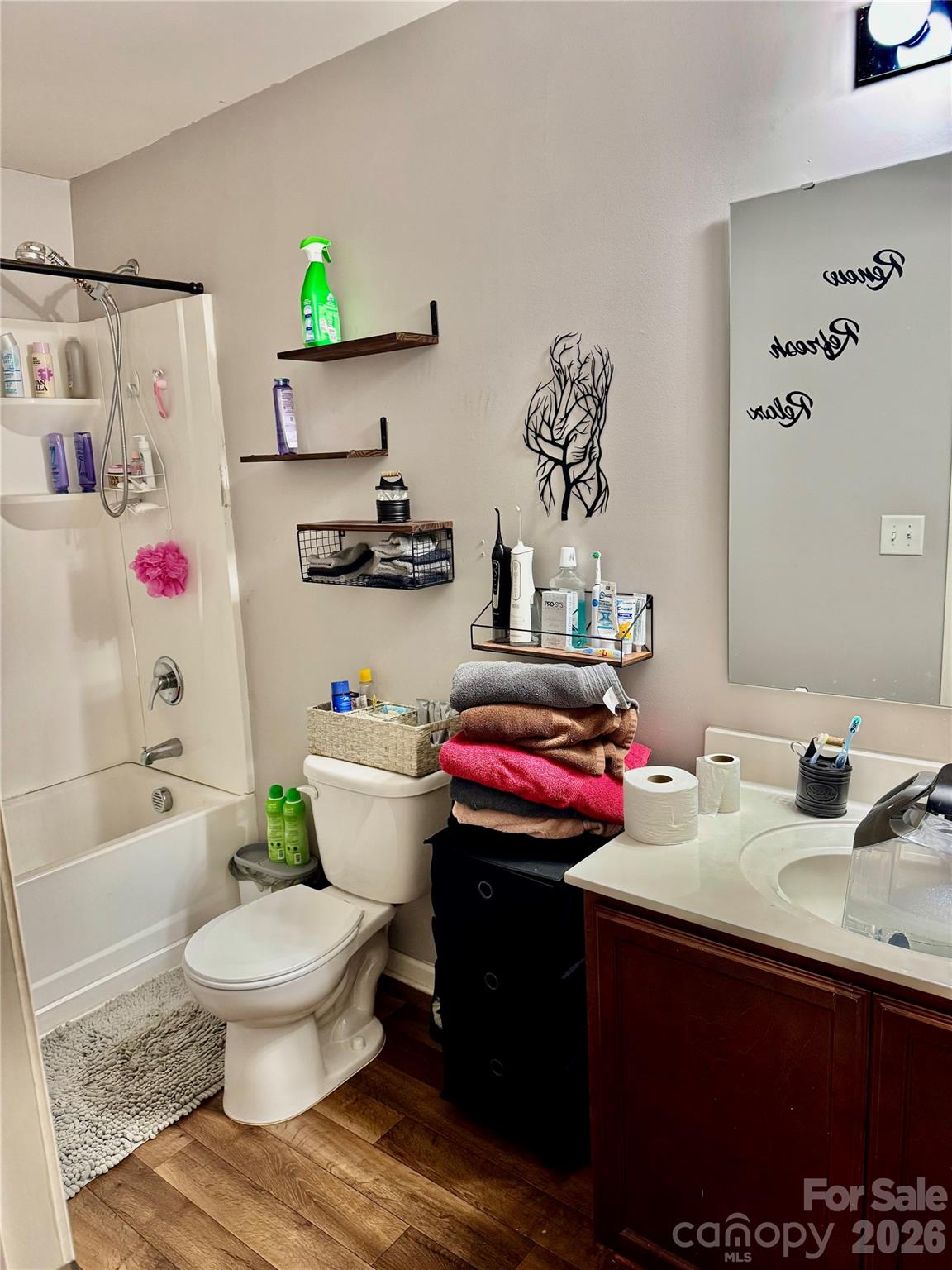 658 Buckskin Road Oakboro, NC 28129 - Photo 26 of 30 a bathroom with a sink toilet and a bathtub