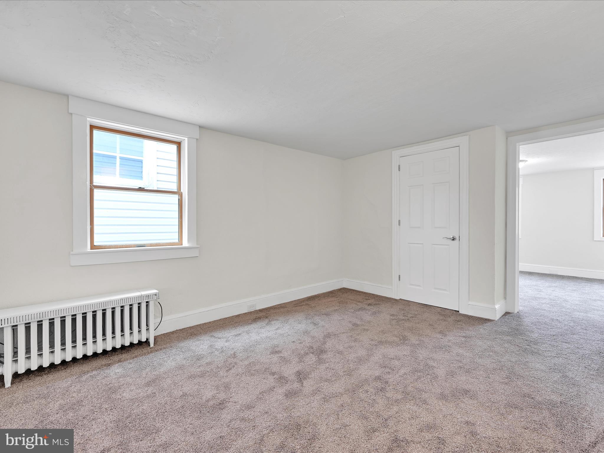 142 West Ruddle Street Coaldale, PA 18218 - Photo 12 of 28 a view of an empty room with a window