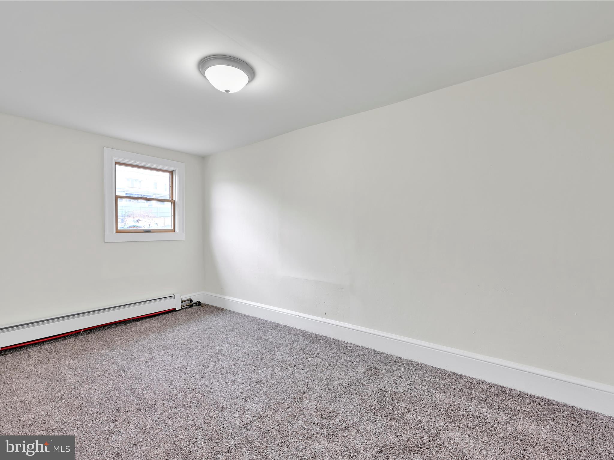 142 West Ruddle Street Coaldale, PA 18218 - Photo 18 of 28 an empty room with windows and closet
