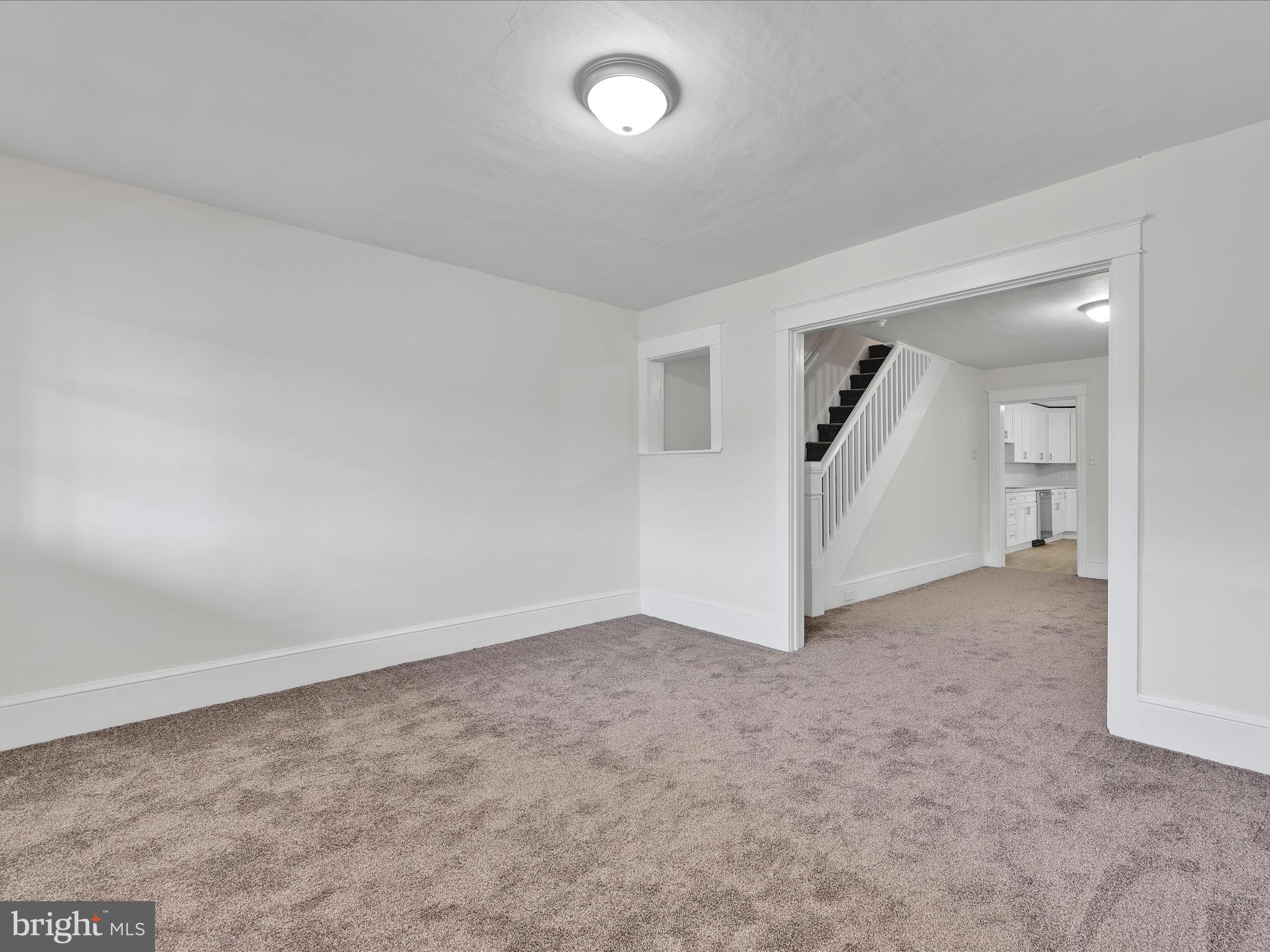 142 West Ruddle Street Coaldale, PA 18218 - Photo 4 of 28 an empty room with white walls and white walls