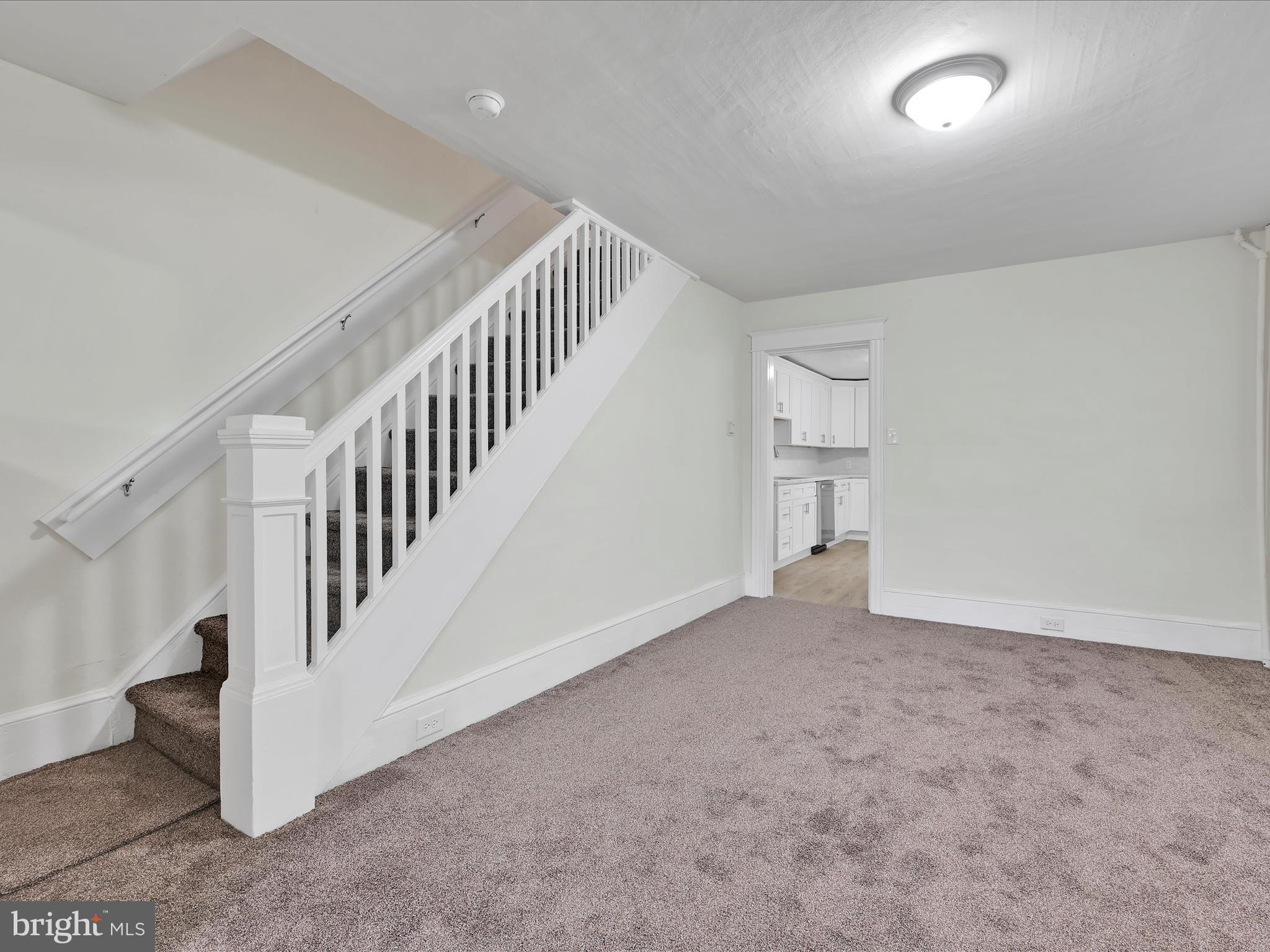 142 West Ruddle Street Coaldale, PA 18218 - Photo 5 of 28 a view of an empty room with stairs