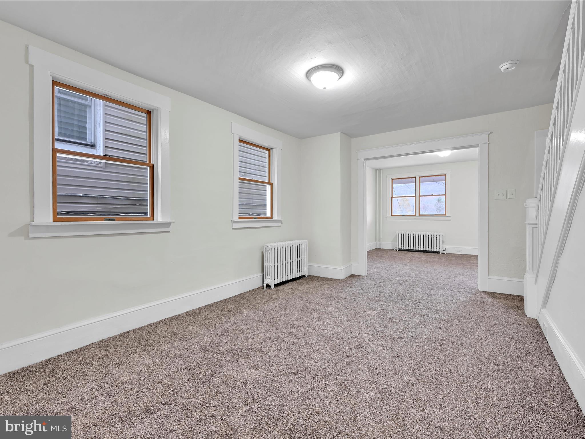 142 West Ruddle Street Coaldale, PA 18218 - Photo 6 of 28 an empty room with windows