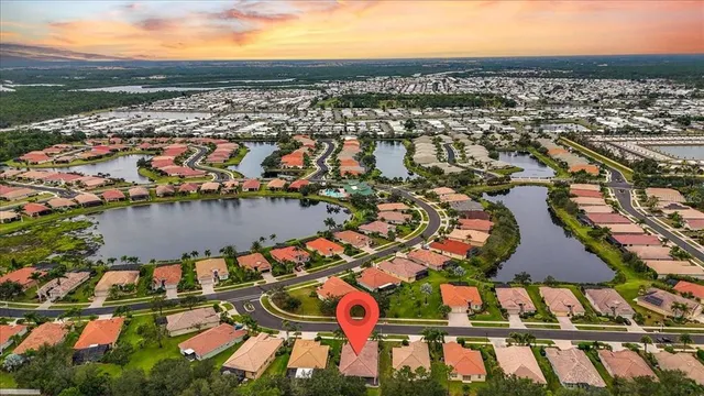 an aerial view of residential houses and outdoor space