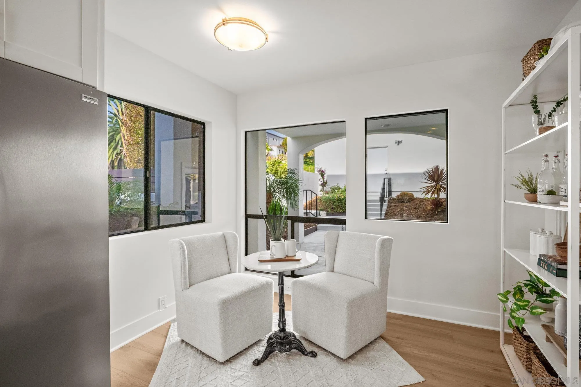 1712 Beryl Street San Diego, CA 92109 - Photo 12 of 37 a living room with furniture and a large window
