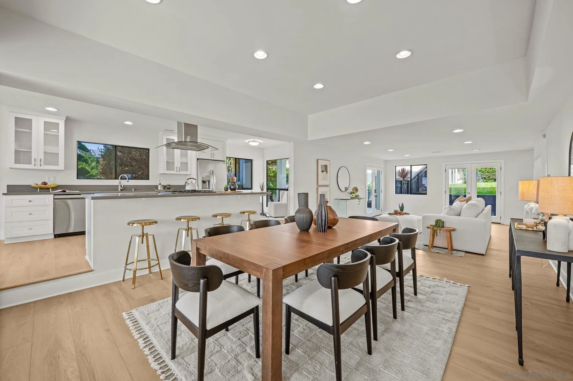1712 Beryl Street San Diego, CA 92109 - Photo 13 of 37 a view of a dining area with furniture and wooden floor