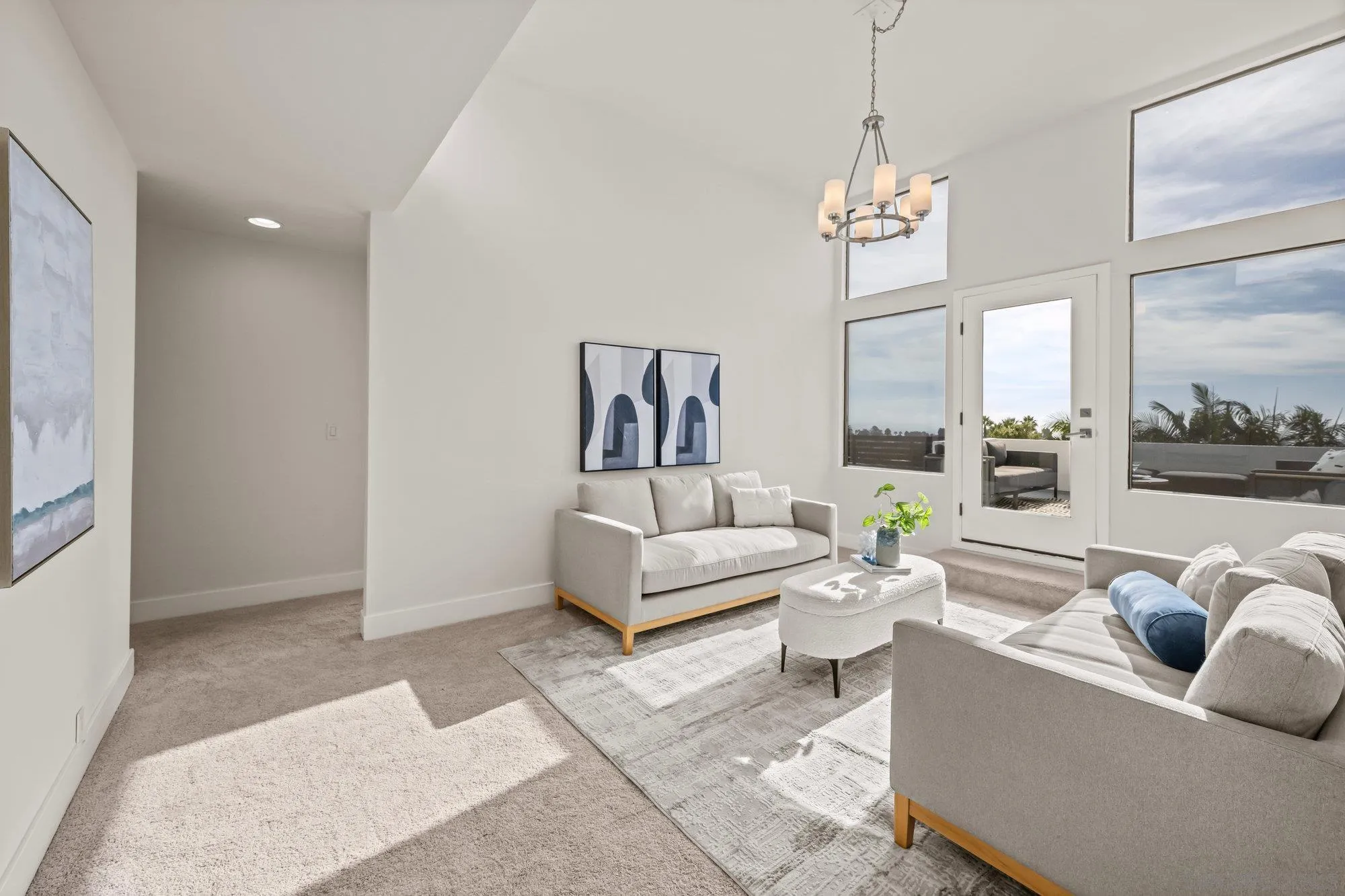 1712 Beryl Street San Diego, CA 92109 - Photo 20 of 37 a living room with furniture and a large window
