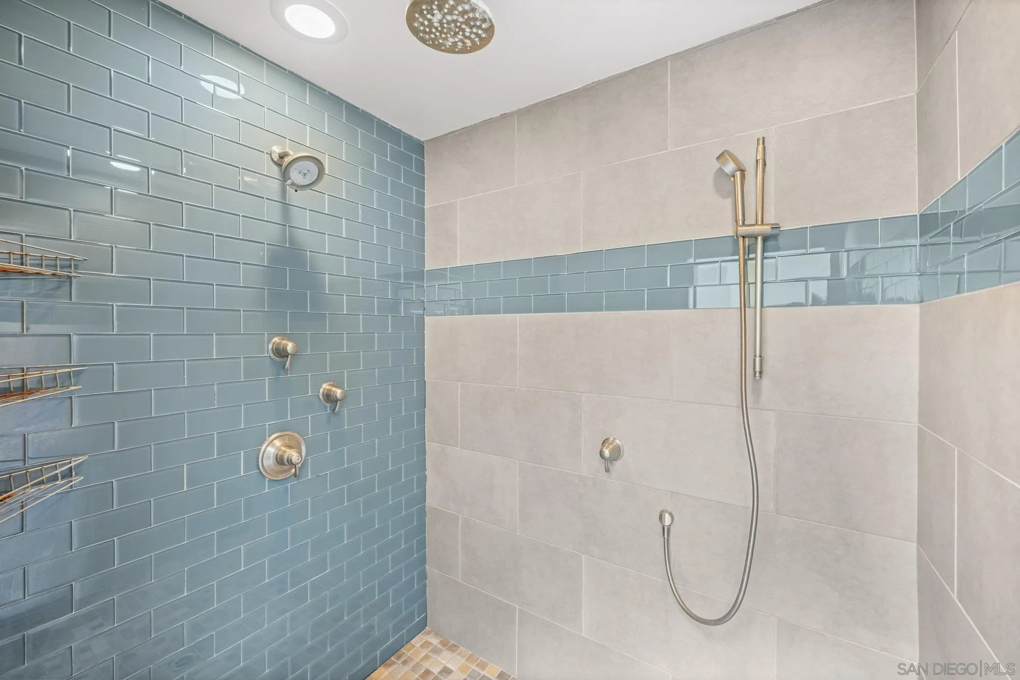 1712 Beryl Street San Diego, CA 92109 - Photo 23 of 37 a bathroom with a shower