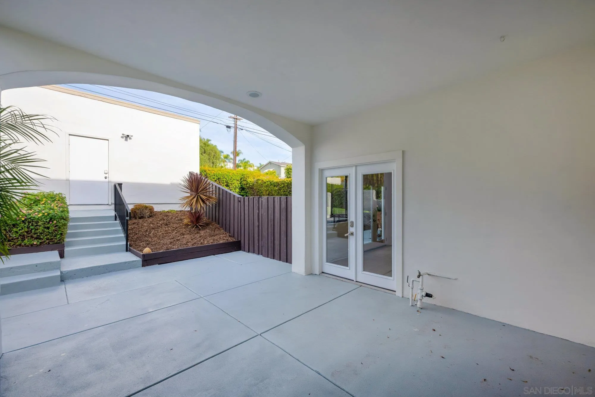 1712 Beryl Street San Diego, CA 92109 - Photo 34 of 37 a view of an empty room and glass door