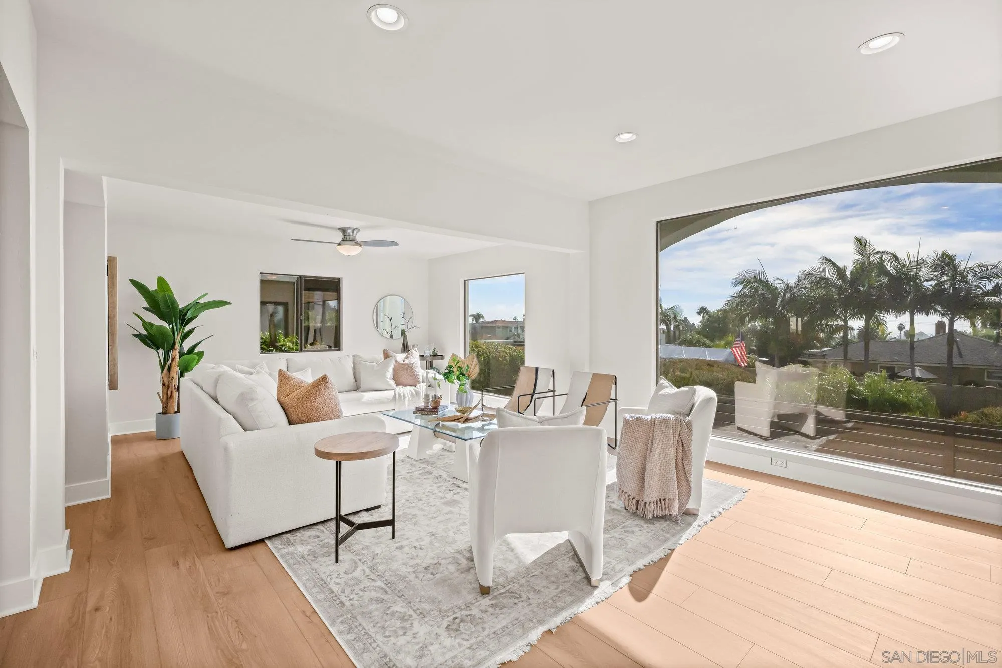 1712 Beryl Street San Diego, CA 92109 - Photo 6 of 37 a living room with furniture and a large window