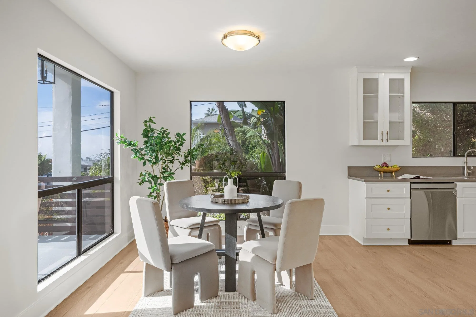 1712 Beryl Street San Diego, CA 92109 - Photo 8 of 37 a view of a dining room with furniture window and outside view
